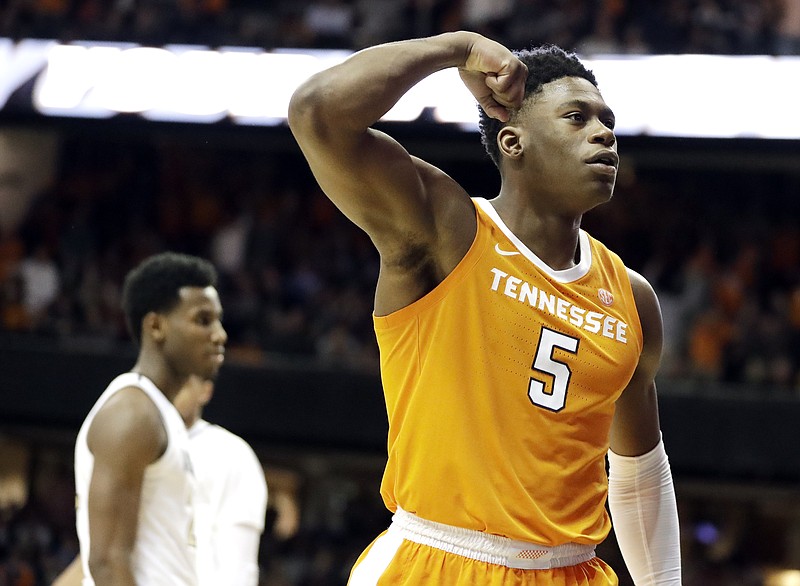 Tennessee guard Admiral Schofield celebrates after a score against Vanderbilt in overtime Wednesday night in Nashville. Schofield struggled in the game, scoring just six points on 2-for-9 shooting — including 0-for-6 from 3-point range — but the Vols found a way to win 88-83 in overtime, largely because of Grant Williams' 43-point performance.