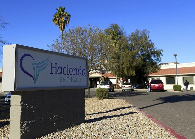 This Friday, Jan. 4, 2019, file photo shows Hacienda HealthCare in Phoenix. Two doctors who cared for an incapacitated woman who gave birth as a result of a sexual assault are no longer providing medical services at the long-term care center in Phoenix, Hacienda HealthCare said Sunday, Jan. 20. (AP Photo/Ross D. Franklin, File)
