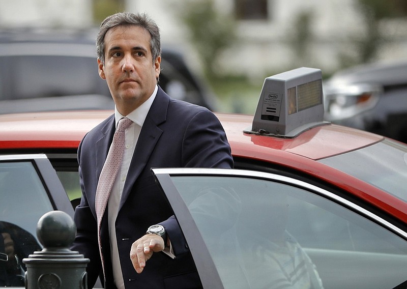 In this Sept. 19, 2017, file photo, Michael Cohen, President Donald Trump's personal attorney, steps out of a cab during his arrival on Capitol Hill in Washington. Cohen won't appear as scheduled before the House Oversight and Reform Committee on Feb. 7, 2019. Cohen's adviser Lanny Davis says the delay is on the advice of Cohen's lawyers because Cohen's still cooperating in special counsel Robert Mueller's Russia investigation. (AP Photo/Pablo Martinez Monsivais, file)