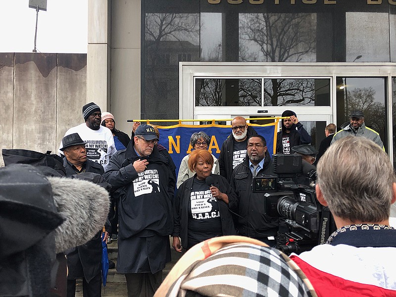 NAACP gathers on steps of Hamilton County Justice Building to speak out on police brutality. 