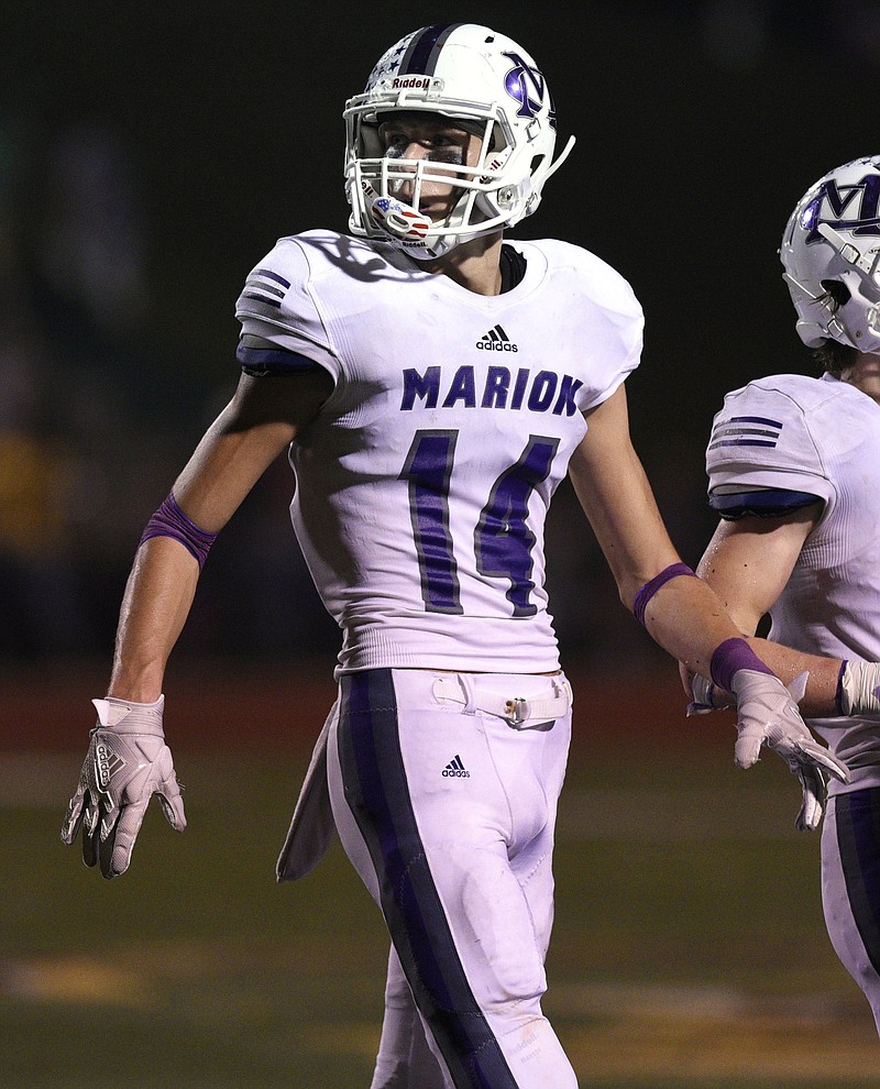 Marion County senior Reece Barton played receiver and defensive back for the school's football team this past fall, and this winter he is playing basketball for the Warriors but also competing for Whitwell's co-op wrestling program. Marion County does not have a wrestling team.