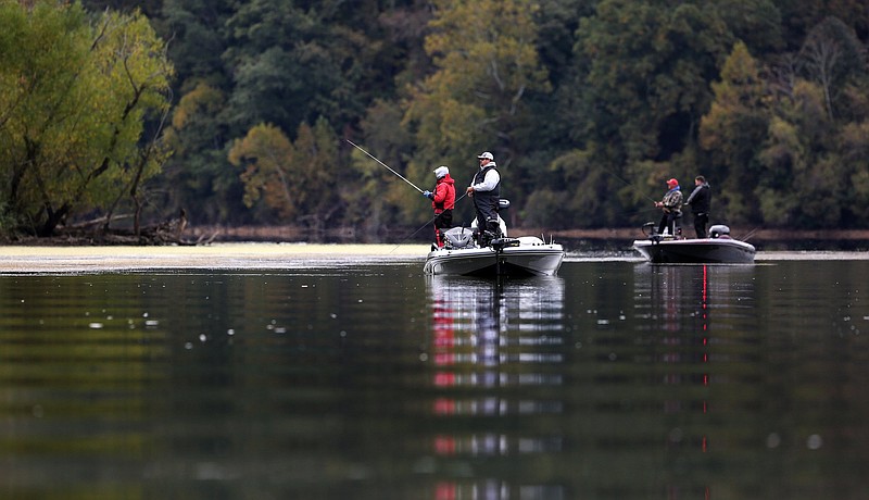 Staff photo by Erin O. Smith / 
Anglers fish during the Fishing League Worldwide Bass Fishing League Regional Championship tournament Thursday, October 25, 2018 held on Lake Chickamauga in Dayton, Tennessee. More than 200 anglers took part in the event. The grand prize winner will get a boat and a check for $20,000, and the top co-angler will get a new boat.