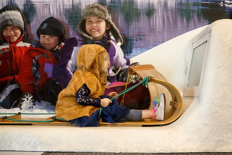 Emma Robinson, 4, plays on the toboggan display at the Creative Discovery Museum on Sunday, Jan. 27, 2019 in Chattanooga, Tenn. The display was a part of the "Native Voices: New England Tribal Families" exhibit, which is on display until May 12. According to the Creative Discovery Museum's website, the "Native Voices" exhibit "introduces families to five Native American communities in New England" and "takes visitors beyond traditional tales where you will experience their traditions trough a series to environments and activities."