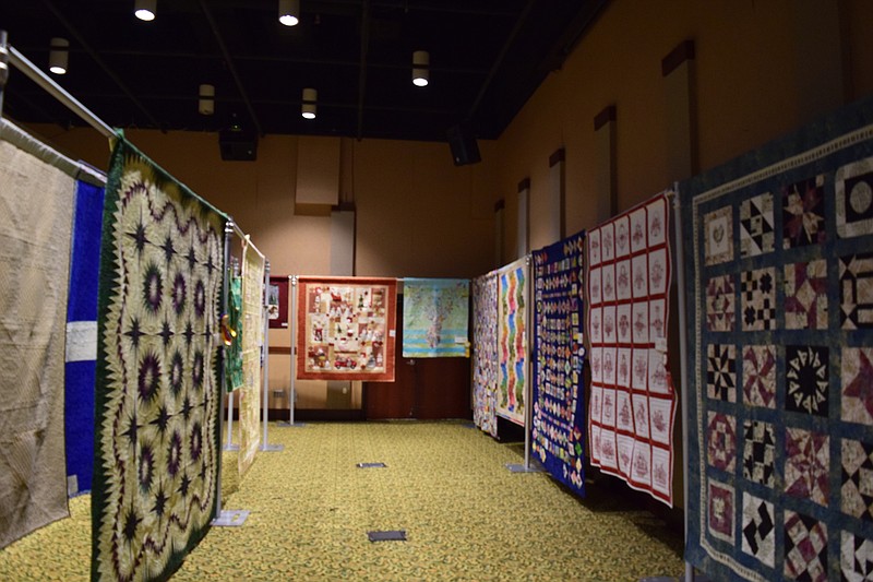 Quilts from the 2018 Stitches in Time Quilt Show hang in an exhibition hall at the Museum Center at Five Points. Submissions into the show increased this year, with more than 100 on display. (Photo from Museum Center at Five Points)