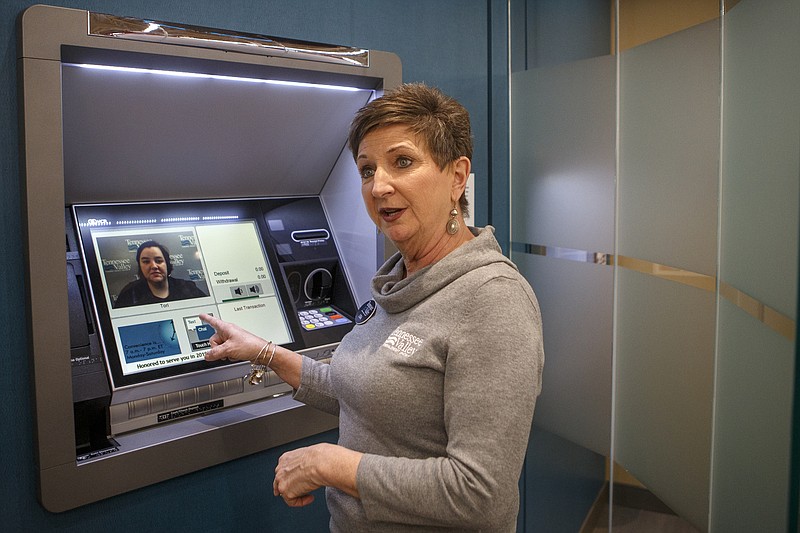 Tennessee Valley Federal Credit Union Vice President of Branch Operations Lisa Elrod demonstrates an ITM at their branch inside of the new Food City located at 150 Highway 41 on Tuesday, Jan. 29, 2019 in Ringgold, Ga. The ITM connects users to a live teller from downtown Chattanooga.
