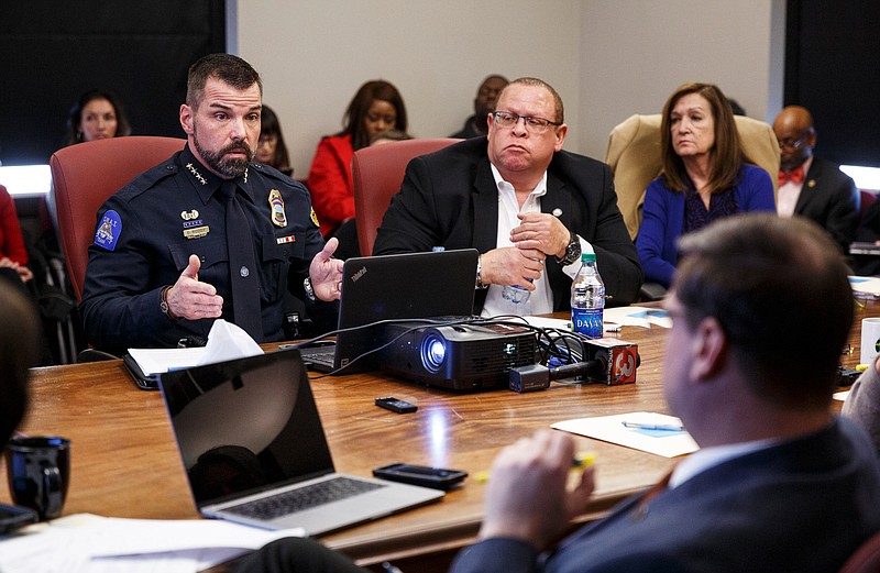 Councilors listen as Police Chief David Roddy, left, speaks during a City Council work session at the Chattanooga City Council building on Tuesday, Jan. 29, 2019, in Chattanooga, Tenn. Chief Roddy explained the departments policies for officer discipline and answered questions from councilors after a video depicting an officer punching a suspect was released earlier this month.