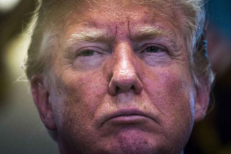 President Donald Trump frowns in the Cabinet Room of the White House in Washington last May. (Doug Mills/The New York Times)