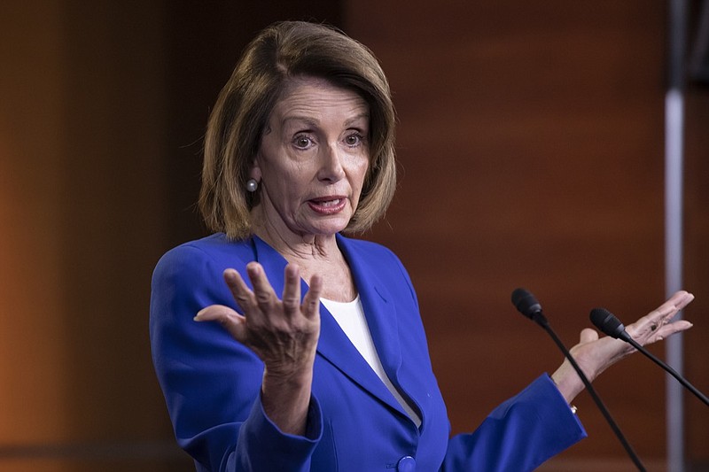 Speaker of the House Nancy Pelosi, D-Calif., talks to reporters during a news conference a day after a bipartisan group of House and Senate bargainers met to craft a border security compromise aimed at avoiding another government shutdown, at the Capitol in Washington, Thursday, Jan. 31, 2019. (AP Photo/J. Scott Applewhite)