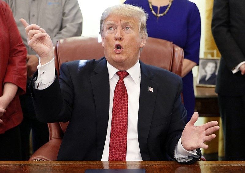 President Donald Trump speaks during a meeting with American manufacturers in the Oval Office of the White House, Thursday, Jan. 31, 2019, in Washington. Trump was signing an executive order pushing those who receive federal funds to "buy American." (AP Photo/Jacquelyn Martin)

