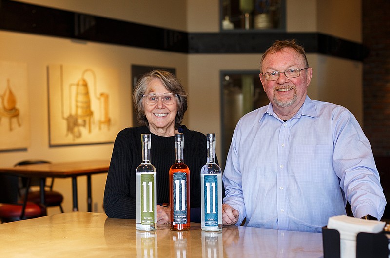 Owners Bill Lee, right, and Wanda Lee pose for a portrait with some of their spirits inside Gate 11 Distillery in the Chattanooga Choo Choo on Wednesday, Jan. 30, 2019, in Chattanooga, Tenn. The distillery, which opened Friday and holds its grand opening Feb. 8, currently produces vodka, gin and whiskey products.