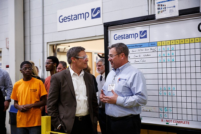 Plant director Corey Jahn, right, speaks with Gov. Bill Lee as he tours Gestamp Inc. on Friday, Feb. 1, 2019, in Chattanooga, Tenn. This was Gov. Lee's first visit to Chattanoga as Governor of Tennessee.