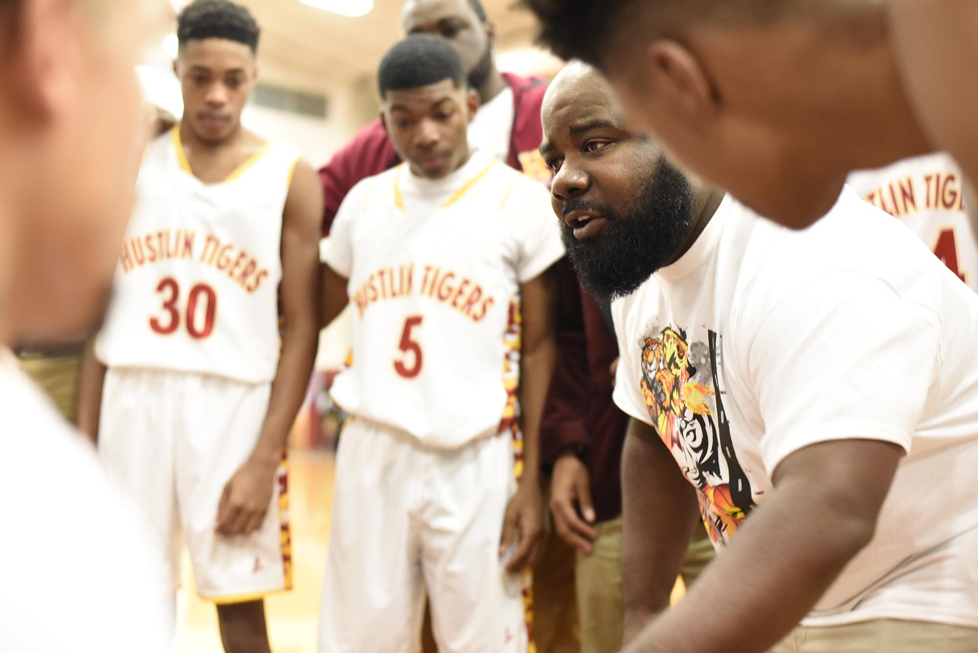 Howard head coach James Talley instructs the Tigers after the first quarter. The Tyner Rams visited the Howard Hustling Tigers in TSSAA boys' basketball on February 1, 2019.