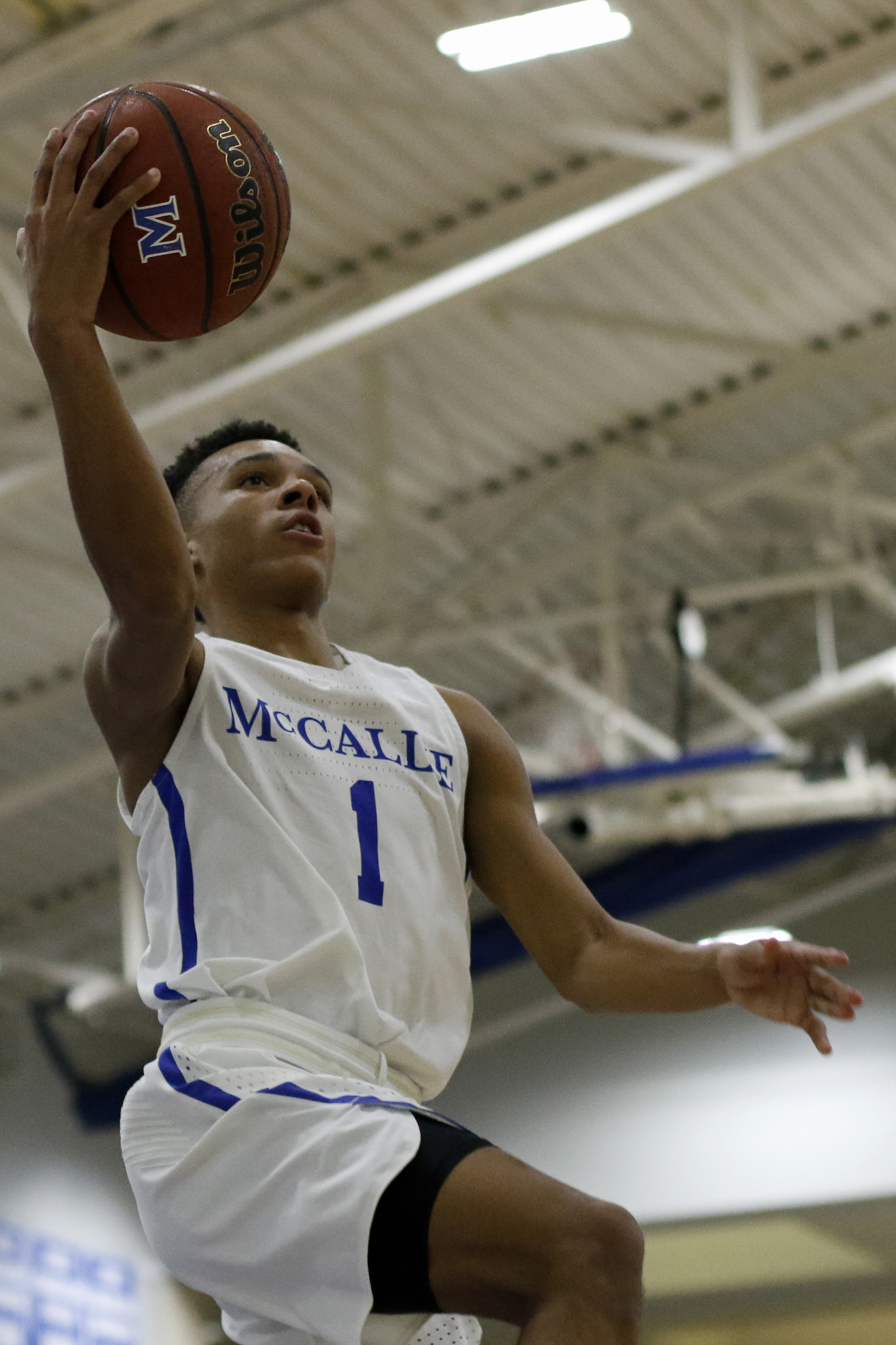 McCallie's Eric Rivers (1) goes up against IMG Academy during The McCallie Dr Pepper TEN Classic at the Walker Forum on the campus of the McCallie School on Friday, Feb. 1, 2019 in Chattanooga, Tenn.