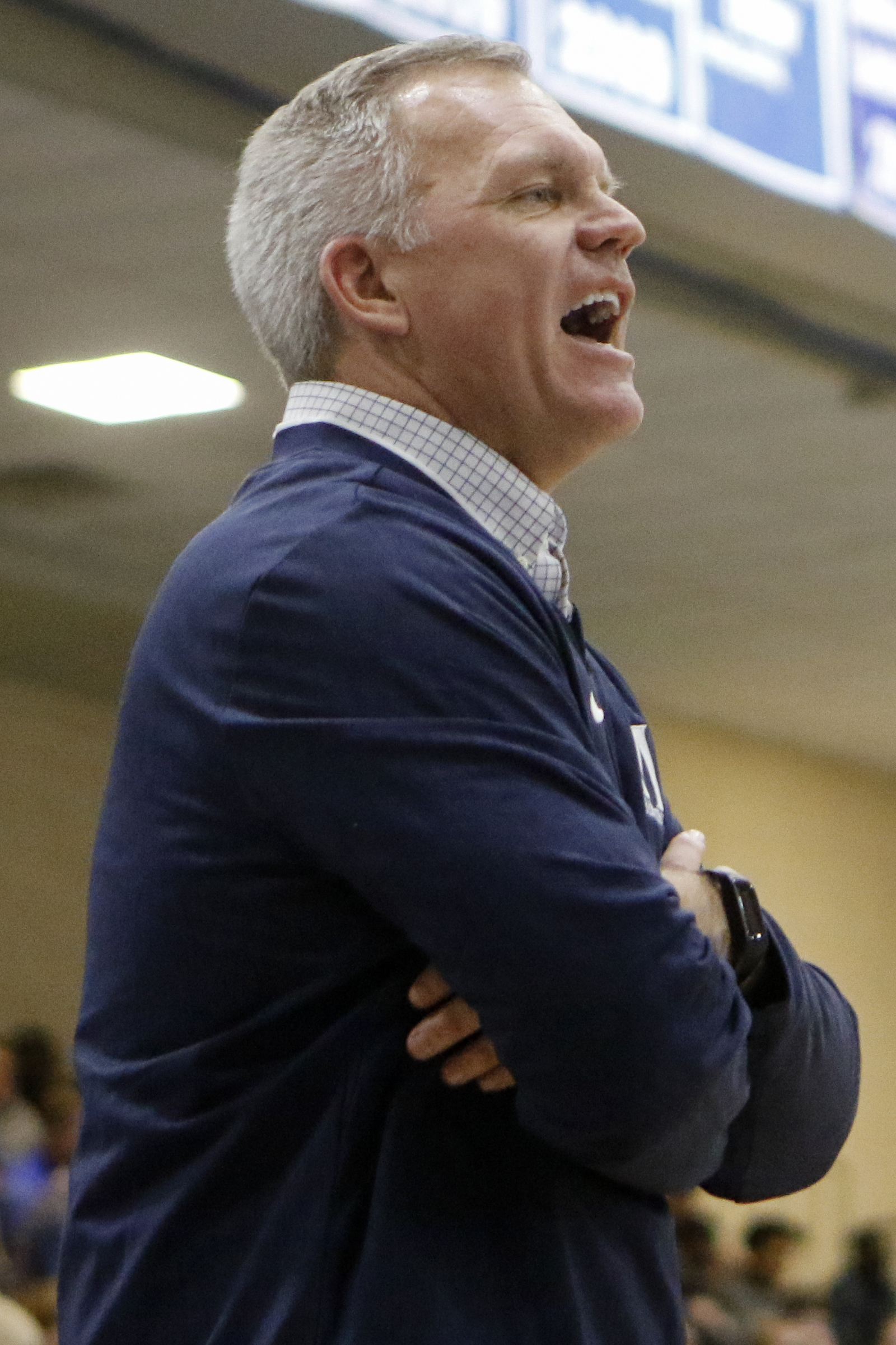 McCallie coach David Conrady reacts during the Blue Tornado's game against IMG Academy during The McCallie Dr Pepper TEN Classic at the Walker Forum on the campus of the McCallie School on Friday, Feb. 1, 2019 in Chattanooga, Tenn.