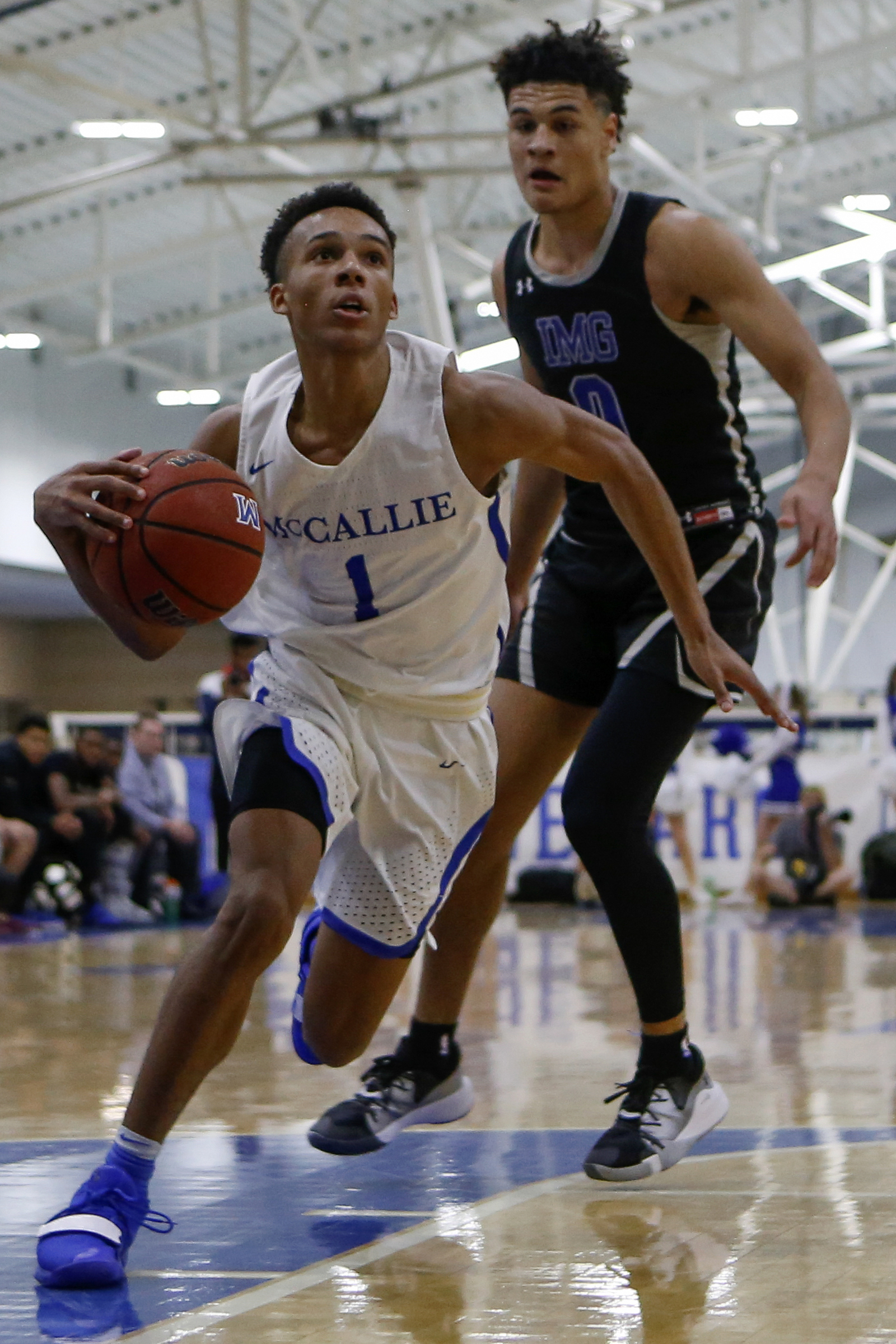 McCallie's Eric Rivers (1) drives against IMG Academy during The McCallie Dr Pepper TEN Classic at the Walker Forum on the campus of the McCallie School on Friday, Feb. 1, 2019 in Chattanooga, Tenn.