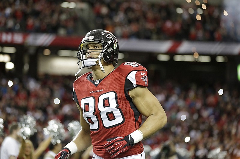 Atlanta Falcons tight end Tony Gonzalez takes the field before a game against the Carolina Panthers in December 2013 in Atlanta.
