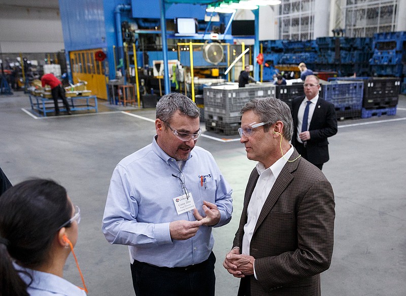 Staff photo by Doug Strickland / Plant director Corey Jahn, left, speaks with Gov. Bill Lee as he tours Gestamp Inc. on Friday, Feb. 1, 2019, in Chattanooga, Tenn. This was Gov. Lee's first visit to Chattanoga as Governor of Tennessee.