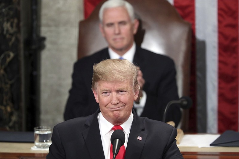 President Donald Trump delivers his State of the Union address to a joint session of Congress on Capitol Hill in Washington, as Vice President Mike Pence watches, Tuesday, Feb. 5, 2019. (AP Photo/Andrew Harnik)

