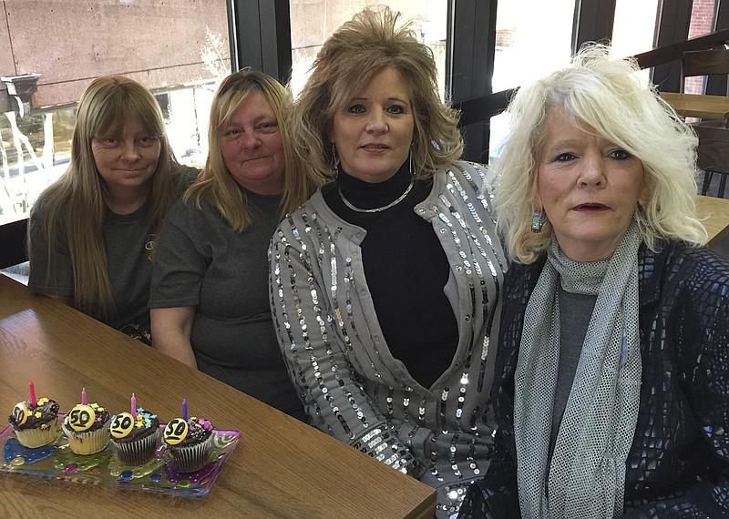 Two sets of twins were born to two sisters-in-law 50 years ago this week in Erlanger hospital. From left are Donna Howard, Dottie Morrow, Carol Reed and Regina Miller.