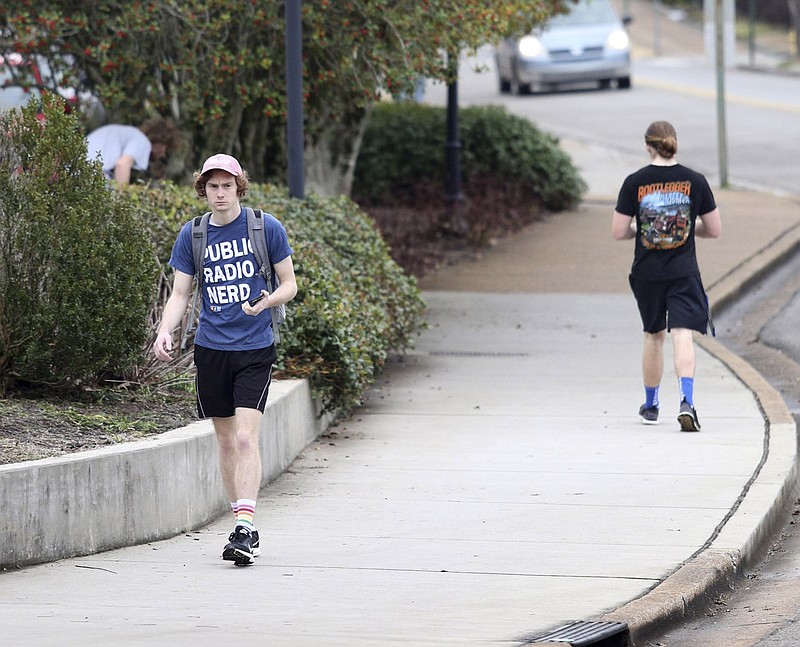 Noah McLane walks across the University of Tennessee at Chattanooga campus wearing shorts and a t-shirt Wednesday, February 6, 2019 in Chattanooga, Tennessee. While Chattanooga saw freezing temperatures and a light snow in some areas last week, Thursday temperatures are expected to get in the high 70s. McLane said last week he was wearing long pants and sweaters.