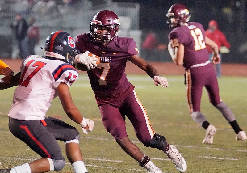 Madison (Ala.) Academy running back Daniel Brent carries the ball during a game against Central-Clay County last November. Although he was his team's leading rusher last season, Brent is expected to play linebacker for UTC after signing with the Mocs on Wednesday.