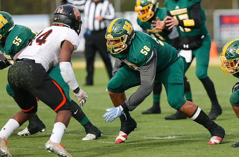 Huntington (W.Va.) offensive lineman Darnell Wright blocks during a playoff game against South Charleston in November 2017. Wright, a 6-foot-6, 320-pounder, signed with Tennessee on Wednesday, giving the Vols a five-star addition to their offensive line.