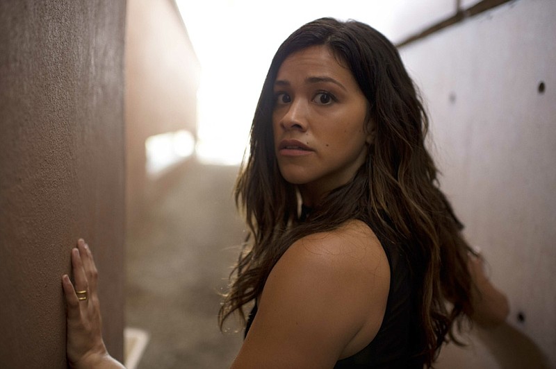 This image released by Sony Pictures shows Gina Rodríguez in a scene from "Miss Bala." (Gregory Smith/Sony Pictures via AP)