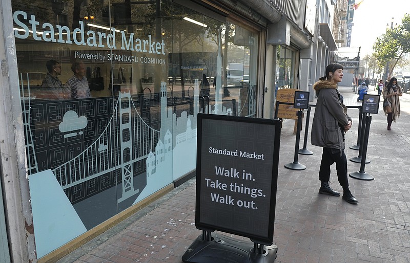 This Nov. 14, 2018, photo shows the Standard Cognition cashier-less store on Market Street in San Francisco. Get ready to say good riddance to the checkout line. A year after Amazon opened its first cashier-less store, startups and retailers are racing to get similar technology in other stores throughout the world, letting shoppers buy groceries without waiting in line. (AP Photo/Eric Risberg)