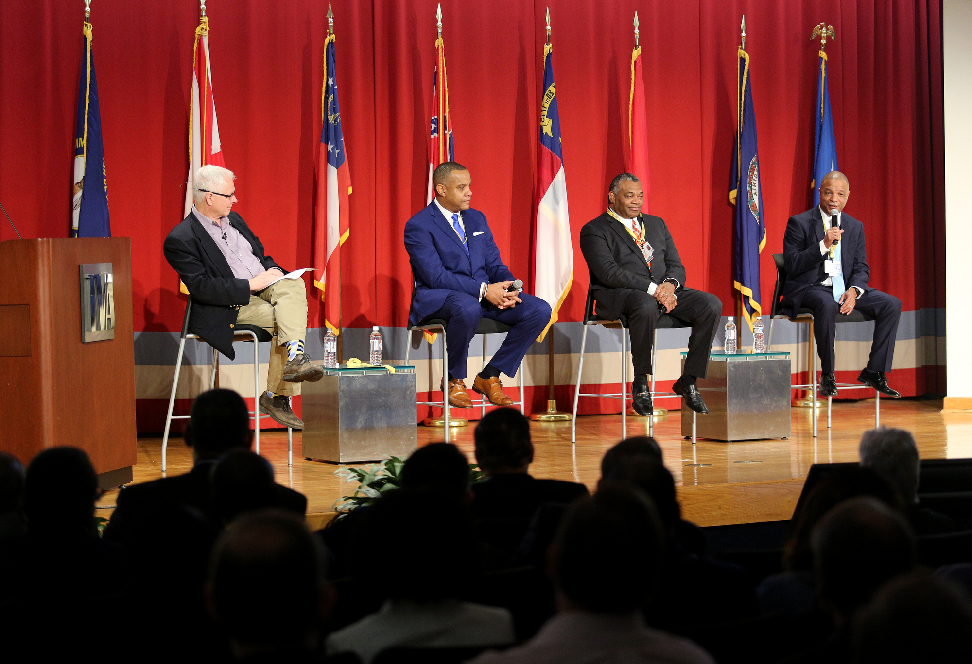 On the right, Robert Gardner, electric utility director of Springfield Electric Department, introduces himself during the American Association of Blacks in Energy panel at the TVA Missionary Ridge Auditorium Friday, February 8, 2019 in Chattanooga, Tennessee. The event was moderated by EPB's CEO David Wade, on the left, and featured a dialog from the three panelists President and CEO of Memphis Light, Gas and Water J.T. Young, President and CEO of Nashville Electric Service Decosta Jenkins and Gardner.