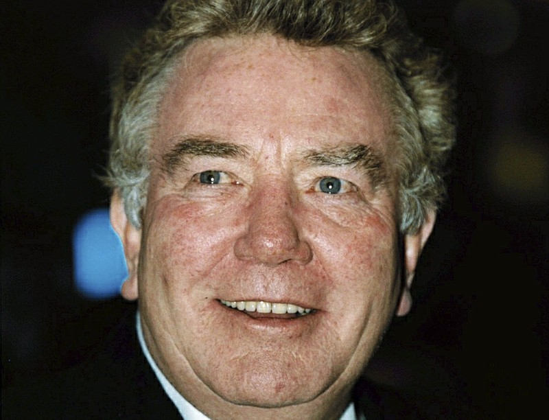 In this Feb. 25, 2001, file photo, actor Albert Finney, poses for a photo. British Actor Albert Finney, the Academy Award-nominated star of films from "Tom Jones" to "Skyfall" has died at the age of 82 it was reported on Friday, Feb. 8, 2019. (William Conran/PA via AP, FIle)