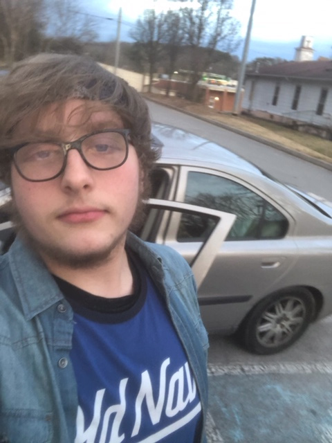 brown hair boy selfie