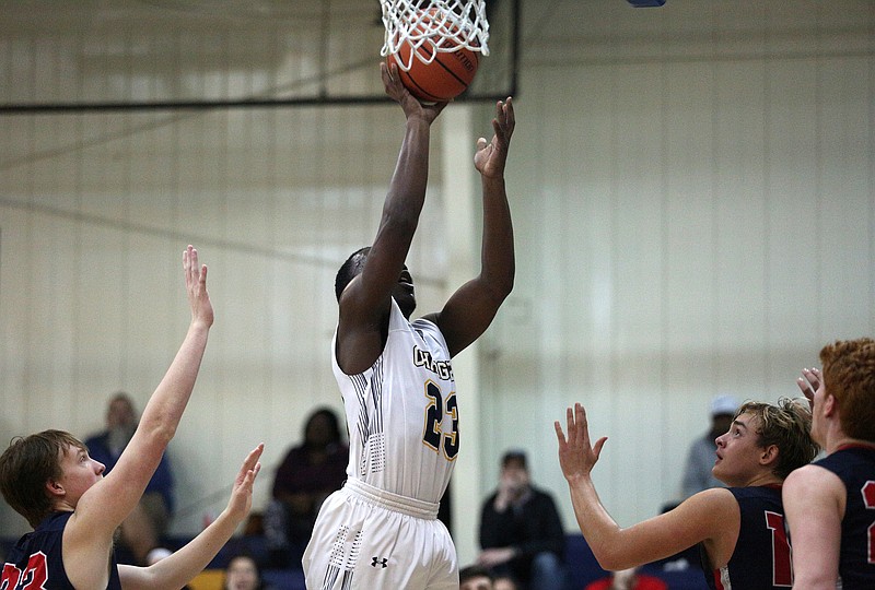 Chattanooga Christian School's Mando Ellison (23) puts up a shot during the Division 2-A Region tournament game between CCS and First Baptist Academy at CCS Monday, February 11, 2019 in Chattanooga, Tennessee.