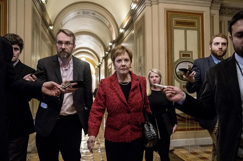 Rep. Kay Granger, R-Texas, ranking member of the House Appropriations Committee, speaks to reporters as she arrives for a closed-door meeting at the Capitol as bipartisan House and Senate bargainers trying to negotiate a border security compromise in hope of avoiding another government shutdown on Capitol Hill, Monday, Feb. 11, 2019, in Washington. (AP Photo/Andrew Harnik)

