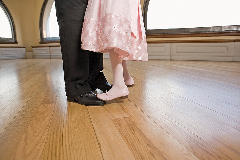 Father-daughter dance / Getty Images