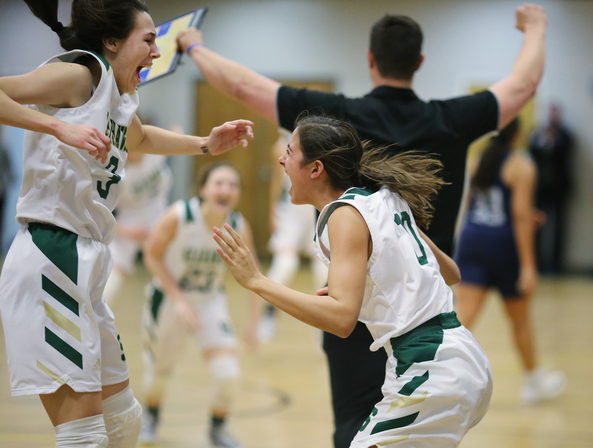 Silverdale's Audrey Canter (3) and Bentlee Stiner (10) celebrate their win over Grace Christian Academy Tuesday, February 12, 2019 at Silverdale Baptist Academy in Chattanooga, Tennessee.