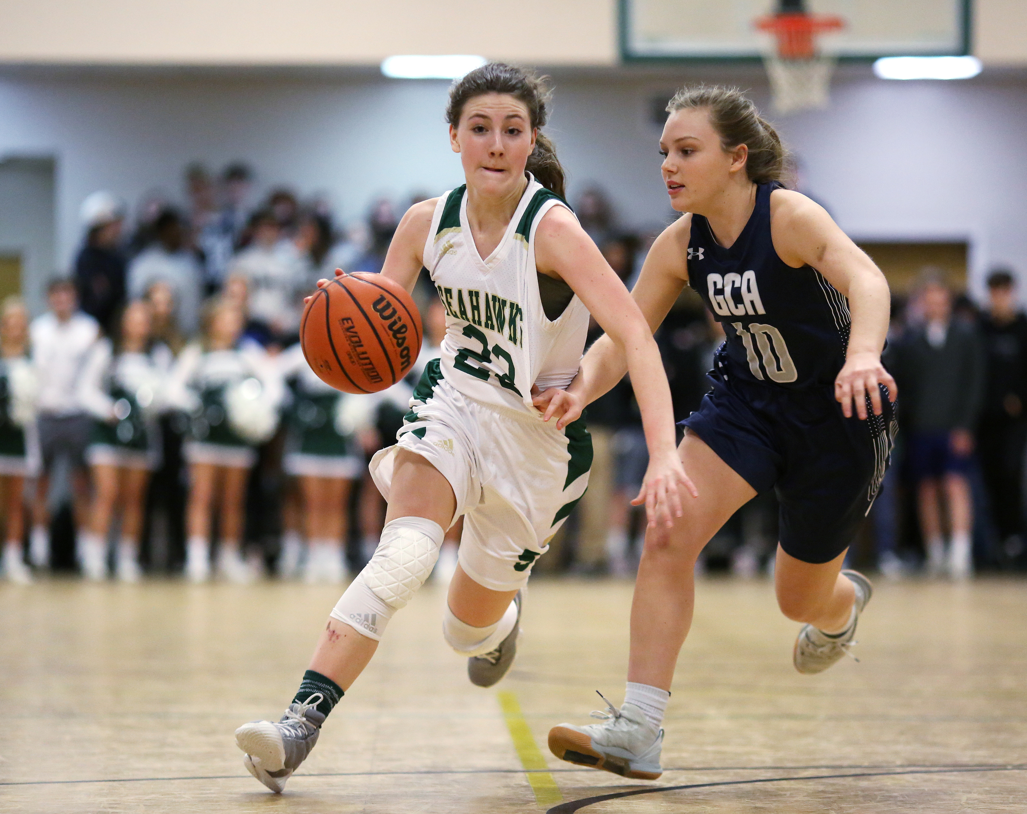 Silverdale's Tessa Gibson (23) pushes the ball downcourt while being guarded by Grace Christian Academy's Chloe Duggins (10) during the Silverdale vs. Grace Christian Academy region tournament game Tuesday, February 12, 2019 at Silverdale Baptist Academy in Chattanooga, Tennessee.