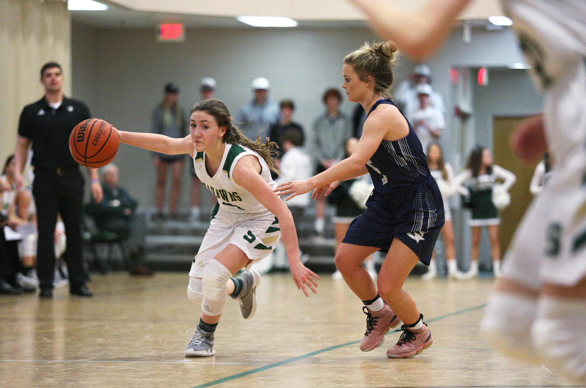Silverdale's Tessa Gibson (23) dribbles the ball downcourt while being guarded by Grace Christian Academy's Cassie Peters (5) during the Silverdale vs. Grace Christian Academy region tournament game Tuesday, February 12, 2019 at Silverdale Baptist Academy in Chattanooga, Tennessee.