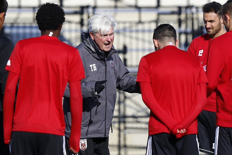 Chattanooga Red Wolves head coach Tim Hankinson talks to his players during practice at David Stanton Field on the campus of Chattanooga Christian School on Friday, Feb. 8, 2019 in Chattanooga, Tenn.