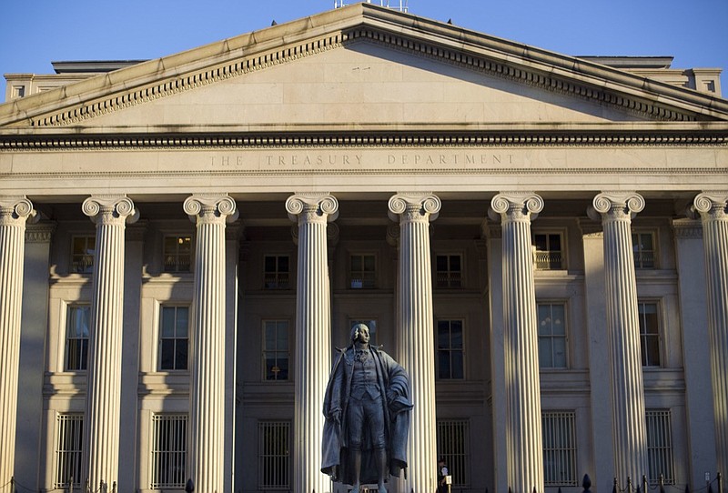 FILE - This June 8, 2017, file photo shows the U.S. Treasury Department building in Washington. (AP Photo/Pablo Martinez Monsivais, File)

