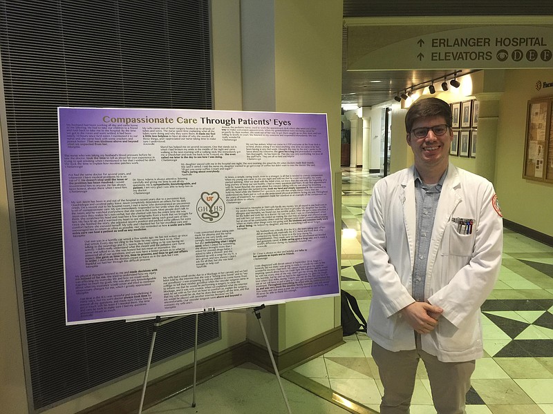 University of Tennessee College of Medicine Chattanooga student Robert Goodrich shows the results of his compassionate care survey.