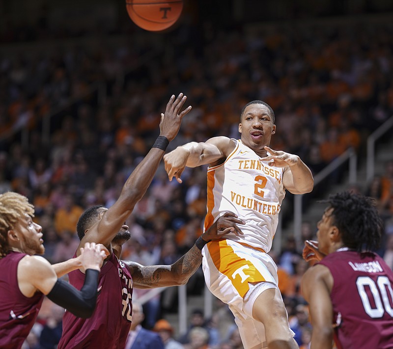 Tennessee's Grant Williams passes during Wednesday night's home win against South Carolina. Although Williams, the SEC's leading scorer, had just eight points against the Gamecocks, he had nine rebounds and seven assists.