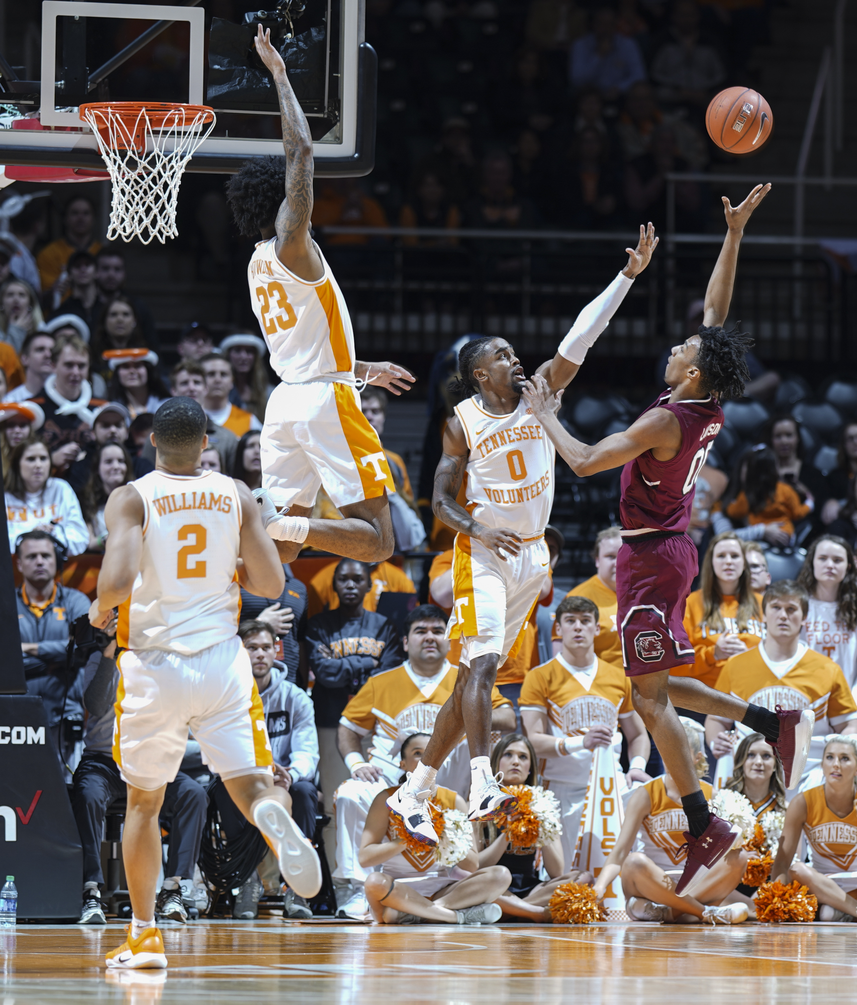 Tennessee's Jordan Bowden (23) and Jordan Bone get in South Carolina's A.J. Lawson face Wednesday night at Thompson-Boling Arena in Knoxville. Also pictured is Tennessee's Grant Williams.