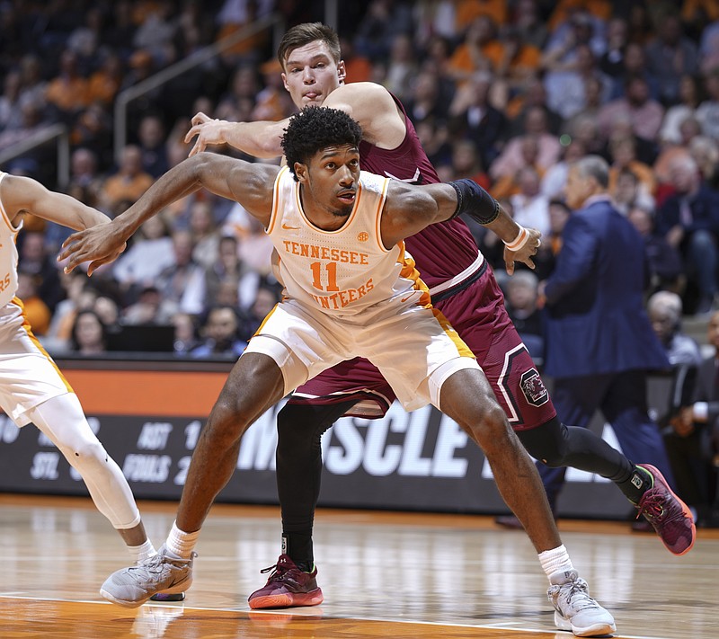 Tennessee's Kyle Alexander blocks out as he looks for the rebound against South Carolina on Wednesday night at Thompson-Boling Arena in Knoxville.