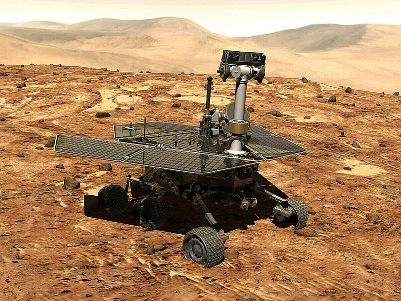 This illustration made available by NASA shows the rover Opportunity on the surface of Mars. The exploratory vehicle landed on Jan. 24, 2004, and logged more than 28 miles (45 kilometers) before falling silent during a global dust storm in June 2018. There was so much dust in the Martian atmosphere that sunlight could not reach Opportunity's solar panels for power generation. (NASA via AP)