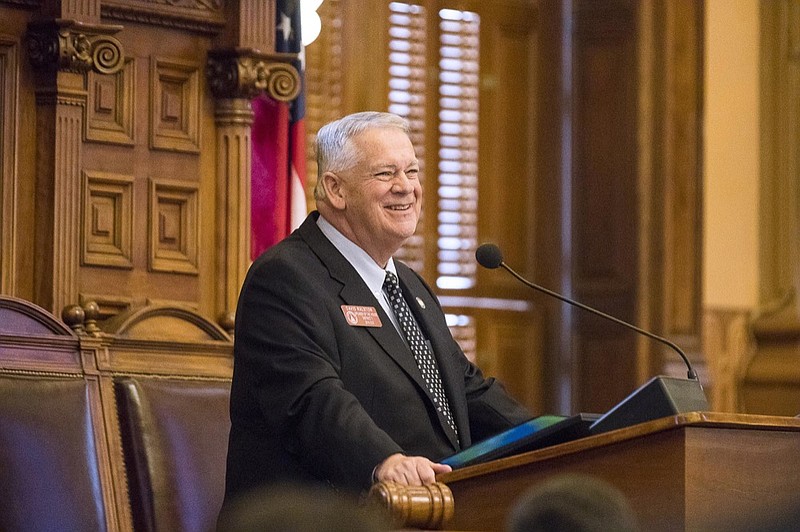 FILE - In a Monday, January 14, 2019 file photo, Speaker of the House David Ralston smiles as he receives a standing ovation in the House chambers after being voted into his position for another two-year-term at the State Capitol building, in Atlanta. Ralston has repeatedly used his office to delay court proceedings, some of them for years, for criminal defendants he represents as an attorney, according to an investigation by two Atlanta news organizations.(Alyssa Pointer/Atlanta Journal-Constitution via AP, File)

