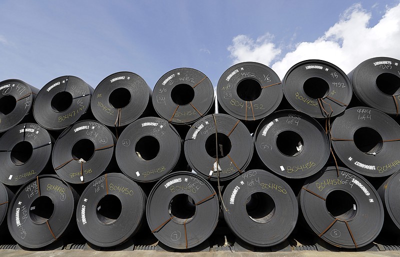 FILE - In this June 5, 2018, file photo, rolls of steel are shown in Baytown, Texas. Despite President Donald Trump's tough talk on trade, his administration has granted hundreds of companies permission to import millions of tons of steel made in China, Japan and other countries without paying the hefty tariff he put in place to protect U.S. manufacturers and jobs, according to an Associated Press analysis.(AP Photo/David J. Phillip, File)