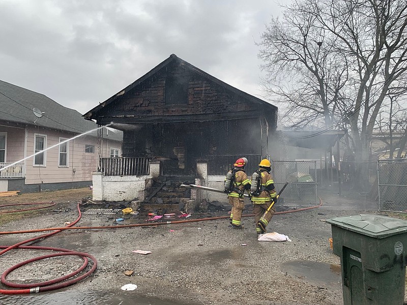 Firefighters work the scene of a fire on the 4300 block of 10th Avenue in East Lake on Friday, Feb. 15, 2019.