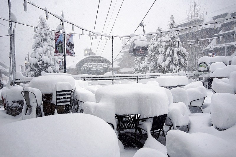 This Friday, Feb. 15, 2019, photo released by Heavenly Mountain Resort shows snow covering chairs and ski equipment at Heavenly Mountain Resort near South Lake Tahoe, Calif. Skiers eager to hit the slopes had to sit out a Presidents' Day holiday weekend as heavy snow and rain fell for a fourth straight day Friday in California's mountains, where the snow was so deep in some areas plows couldn't go out and cities were running out of places to pile it. (Duncan Kincheloe/Heavenly Mountain Resort via AP)

