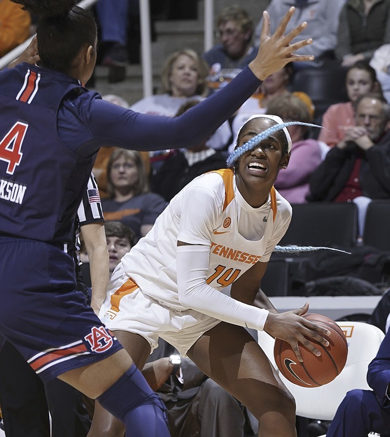 Tennessee's Zaay Green looks for an open teammate while guarded by Auburn's Abigayle Jackson during Thursday night's game in Knoxville. The Lady Vols won 73-62 for their fourth win in five games.