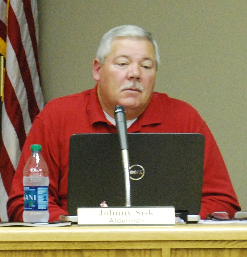 Kimball Alderman Johnny Sisk listens during a December 2013 meeting.